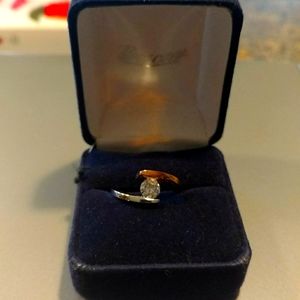 NWOT. Rose and white gold plated CZ ring
